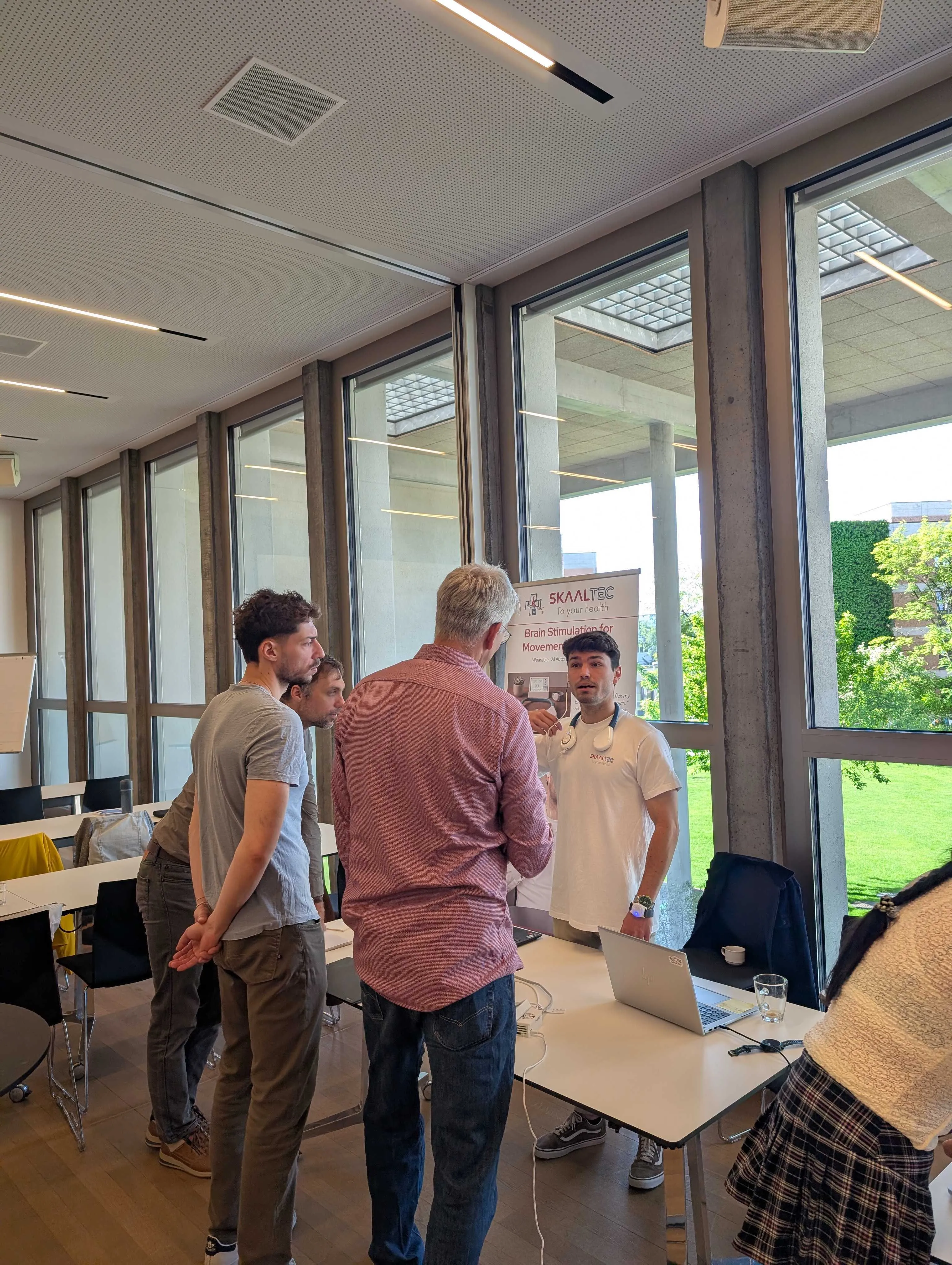 Skaaltec team demoing the SmartVNS wearable neurostimulation system at the ETH Fair of Technology, Balgrist University Hospital